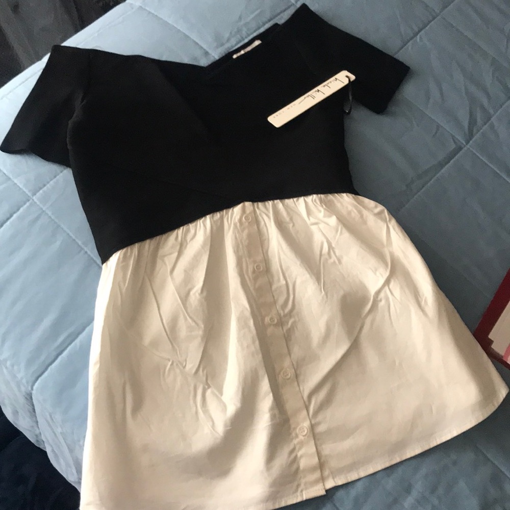Nicole Miller B & W off the shoulders blouse